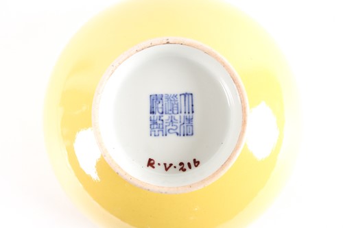 Lot 13 - A Chinese porcelain yellow ground circular...