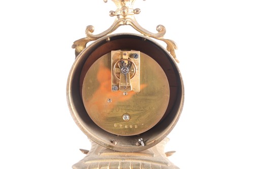 Lot 434 - A Victorian gilt spelter mantel clock, set...