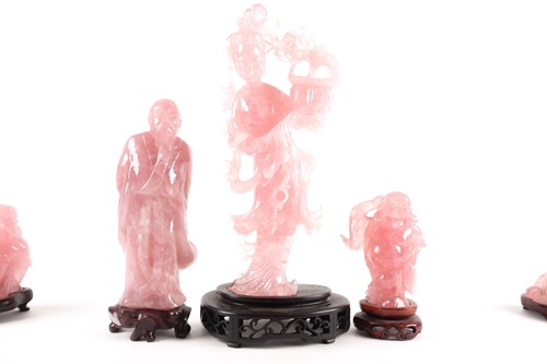 Lot 34 - A group of Chinese rose quartz carved deities,...