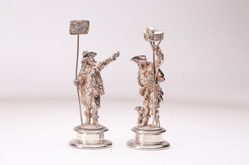 Lot 594 - A pair of French silver plated figural models;...