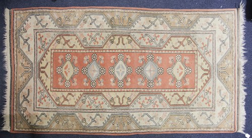 Lot 319 - A 20th-century Turkish runner with a central...