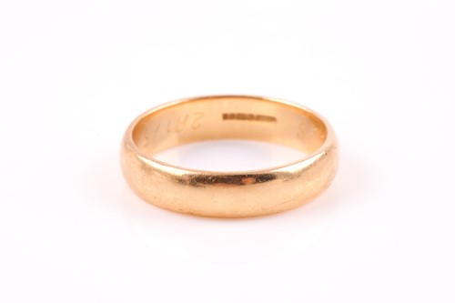 Lot 400 - An 18ct yellow gold wedding band ring, 5 mm...