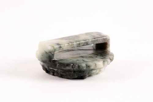 Lot 145 - A Chinese white and spinach green jade...