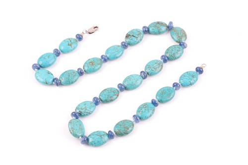 Lot 373 - A turquoise and sapphire beaded necklace, set...