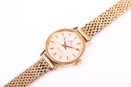 Lot 664 - Omega. A lady's 9ct gold Omega wristwatch, the...