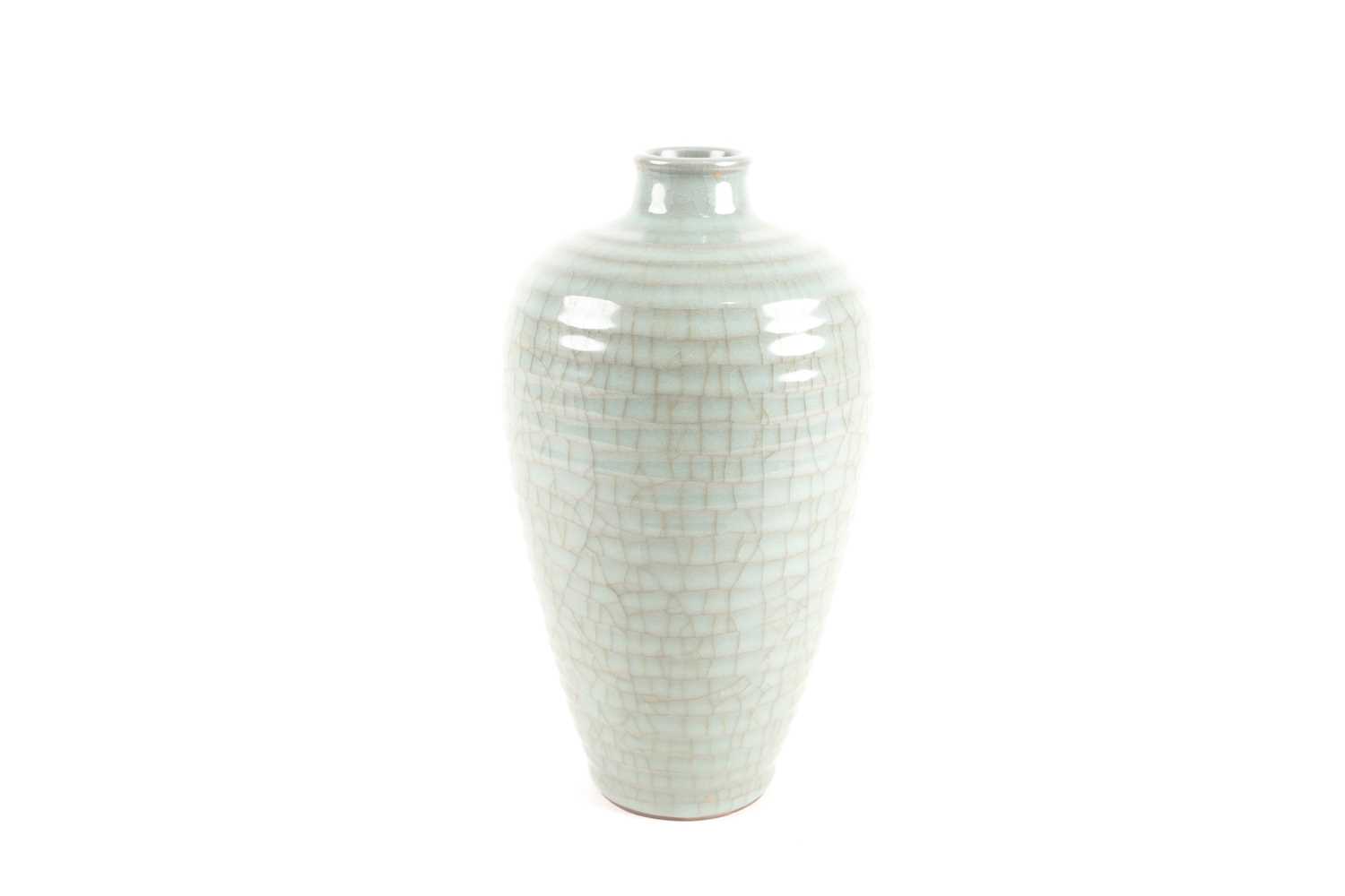Lot 153 - A Chinese Song style celadon meiping vase with...