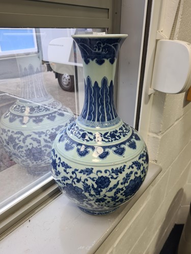 Lot 163 - A Chinese porcelain blue & white lotus vase,...