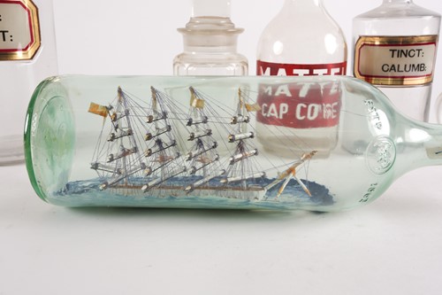 Lot 94 - A late 20th-century model ship in a bottle,...