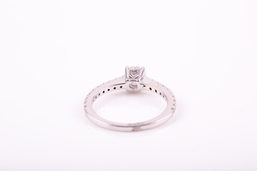 Lot 49 - A single stone diamond ring, the round...