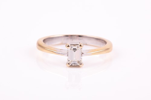 Lot 444 - A single stone diamond ring, the emerald cut...