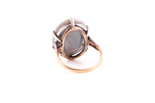 Lot 37 - An 18ct yellow gold and black opal ring, set...