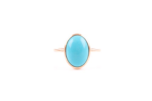 Lot 96 - A 9ct yellow gold and turquoise ring by TJC,...