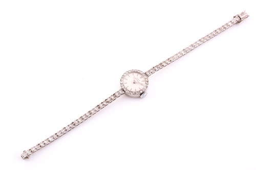 Lot 524 - Girard Perregaux. A lady's diamond cocktail...