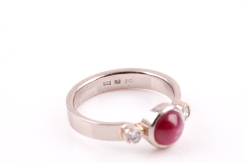Lot 118 - A 14ct white gold, diamond, and star ruby ring,...
