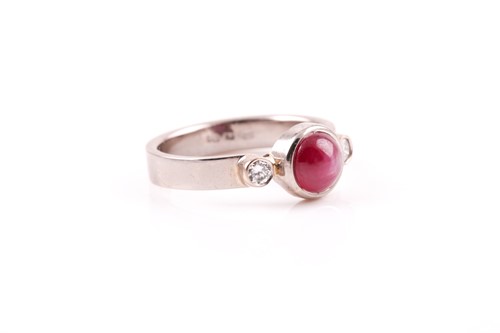 Lot 118 - A 14ct white gold, diamond, and star ruby ring,...