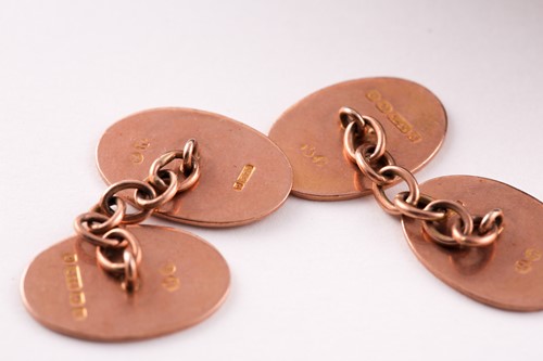 Lot 83 - A pair of 9ct rose gold cufflinks, foliate...