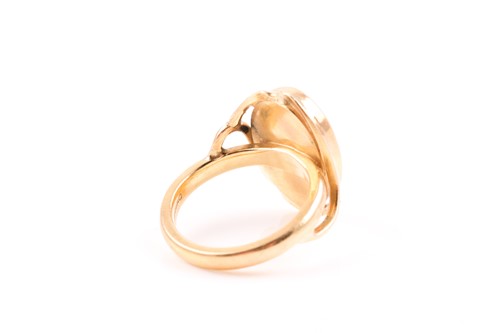 Lot 67 - An 18ct yellow gold and diamond ring, the...