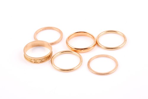Lot 13 - A group of gold rings, including a set of four...
