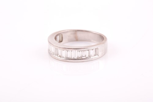 Lot 140 - An 18ct white gold and diamond half eternity...