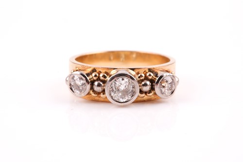 Lot 343 - A yellow metal and diamond ring, collet-set in...