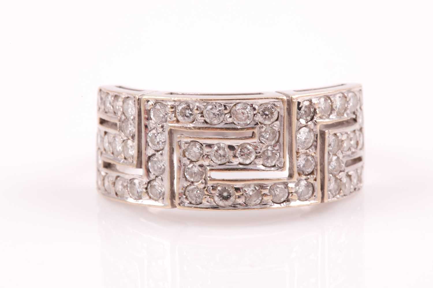 Lot 40 - An 18ct white gold and diamond set ring, in a...