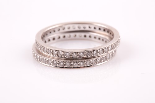 Lot 154 - A pair of 18ct white gold and diamond eterniy...