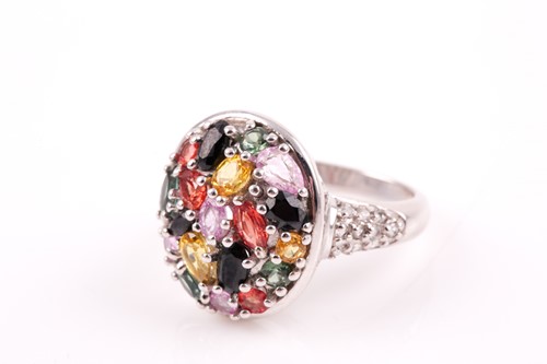 Lot 115 - A 9ct white gold and multi-coloured sapphire...