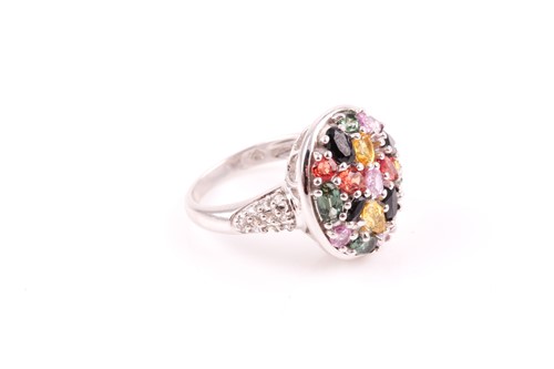 Lot 115 - A 9ct white gold and multi-coloured sapphire...