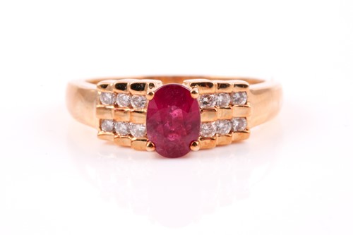 Lot 165 - An 18ct yellow gold, diamond, and ruby ring by...