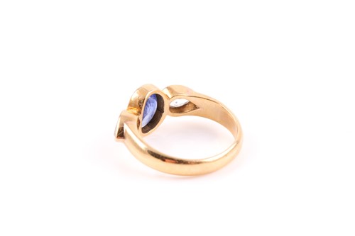 Lot 194 - A yellow metal and sapphire ring, rubover-set...