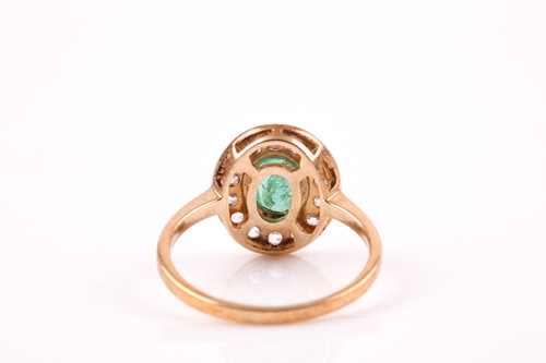 Lot 100 - A 9ct yellow gold, emerald, and cubic zirconia...