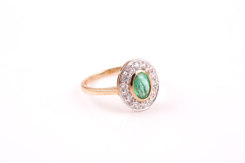 Lot 100 - A 9ct yellow gold, emerald, and cubic zirconia...