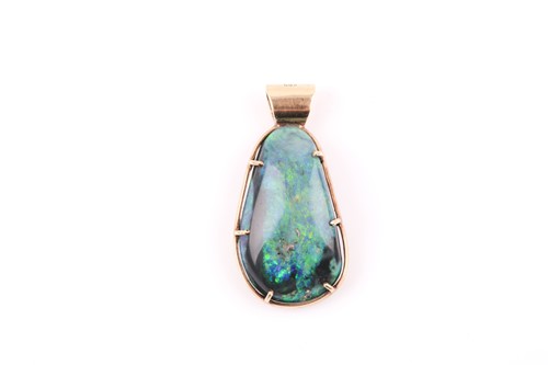 Lot 200 - A 14ct yellow gold mounted smooth boulder opal,...