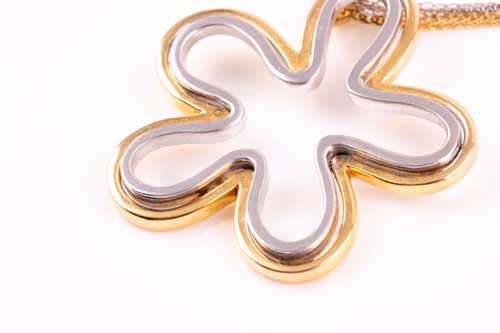 Lot 30 - An 18ct white and yellow gold floral splash...