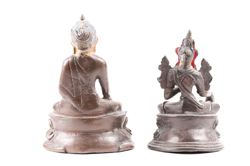 Lot 87 - A Tibetan patinated bronze figure of a Buddha...