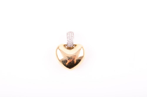 Lot 19 - A 14ct yellow and white gold pendant, the...