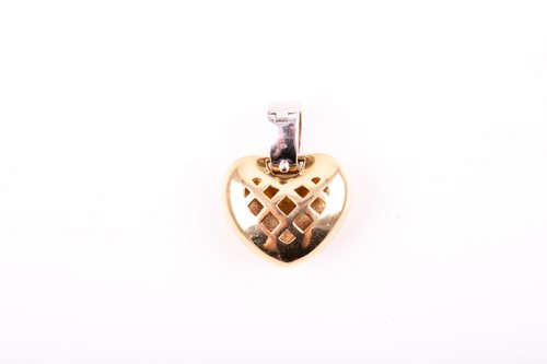 Lot 19 - A 14ct yellow and white gold pendant, the...