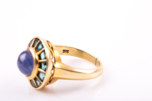 Lot 215 - A 14ct yellow gold, sapphire, and green paste...