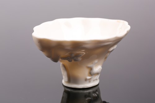 Lot 101 - A Chinese blanc de chine libation cup, Qing...