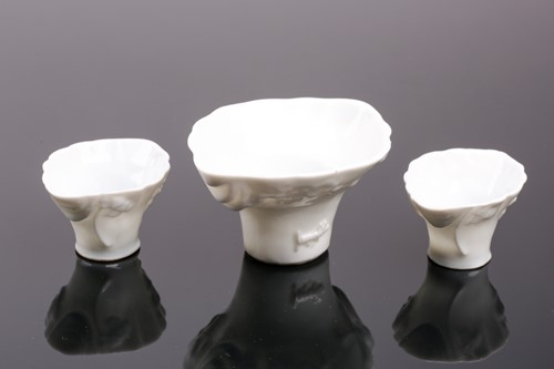 Lot 102 - Three Chinese blanc de chine libation cups,...