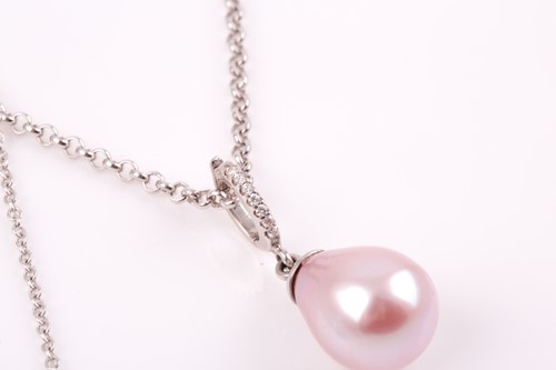 Lot 61 - An 18ct white gold, pink pearl, and diamond...