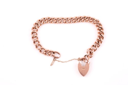 Lot 351 - A 9ct rose gold curb pattern bracelet, with...