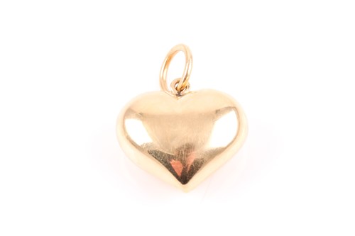 Lot 50 - An 18ct yellow gold hollow heart pendant, of...
