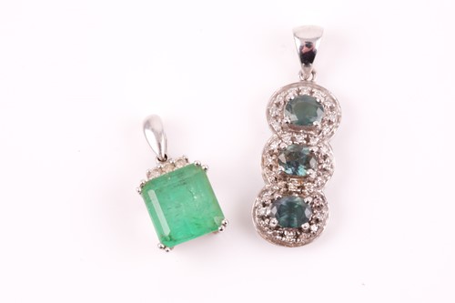 Lot 365 - An emerald pendant, the rectangular step cut,...