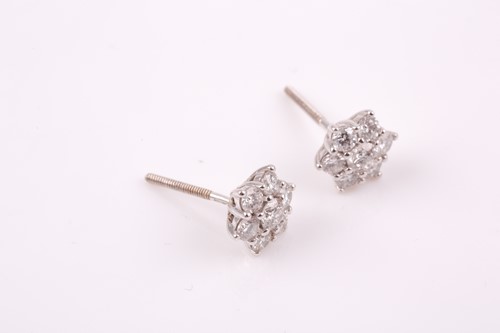 Lot 18 - A pair of 18ct white gold and diamond stud...