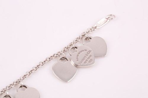 Lot 31 - Tiffany & Co. A silver bracelet set with...