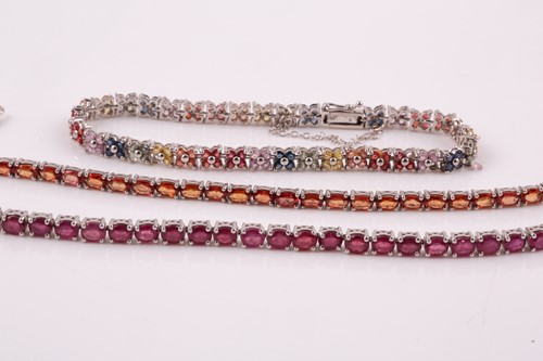 Lot 92 - A silver and ruby line bracelet, together with...
