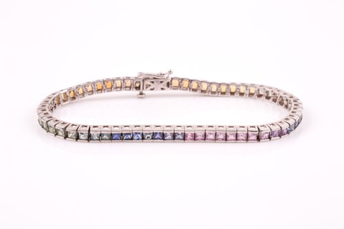 Lot 189 - A silver and multi-coloured sapphire bracelet,...