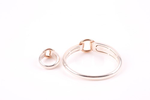 Lot 329 - Mont Blanc. A silver and rose gold bangle and...