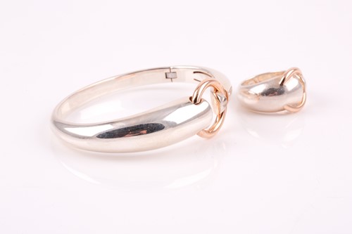 Lot 329 - Mont Blanc. A silver and rose gold bangle and...
